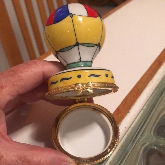 Hot air balloon trinket box colors are red white blue, yellow, green gold trim. - Picture 3 of 3